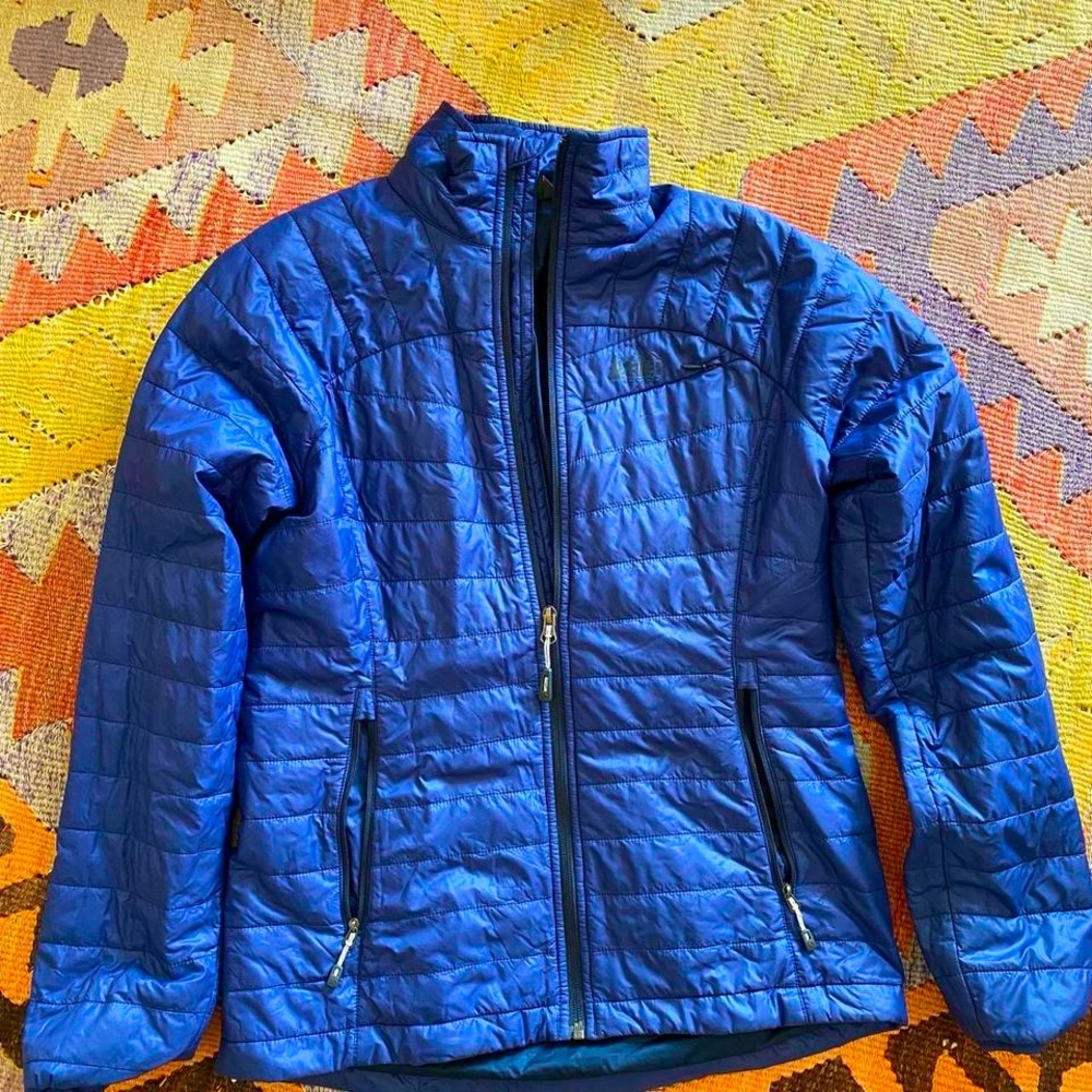 Blue lightweight REI puffer jacket